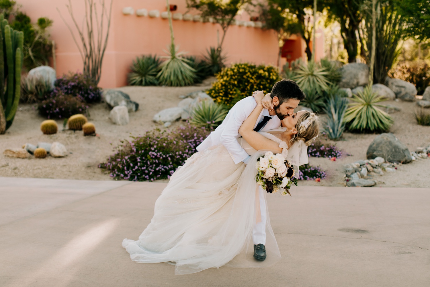 couple wedding portraits at the pond estate palm springs