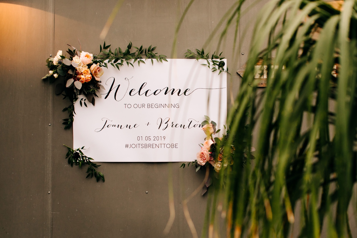 welcome sign with florals