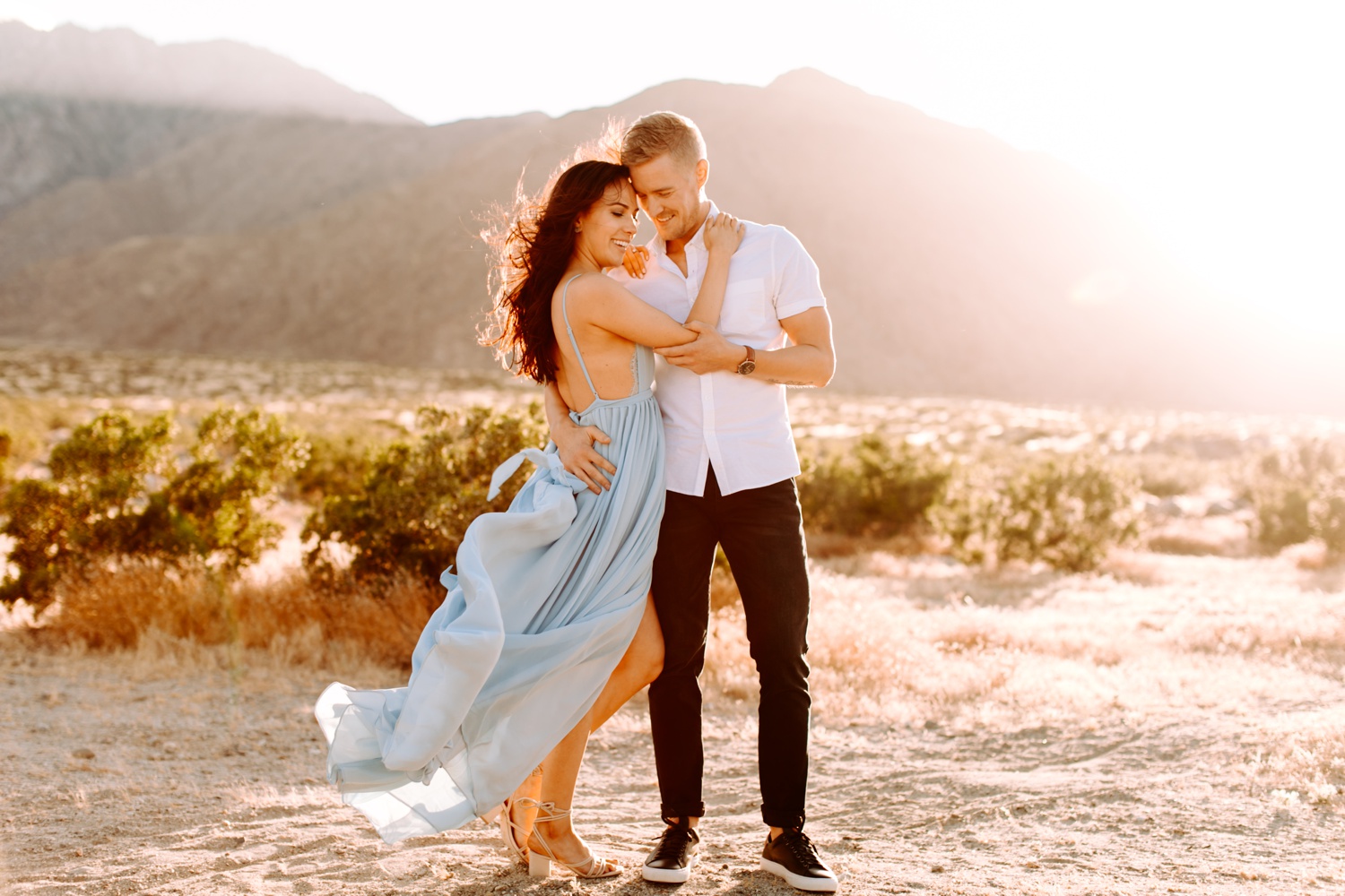 Long dress engagement photos hotsell