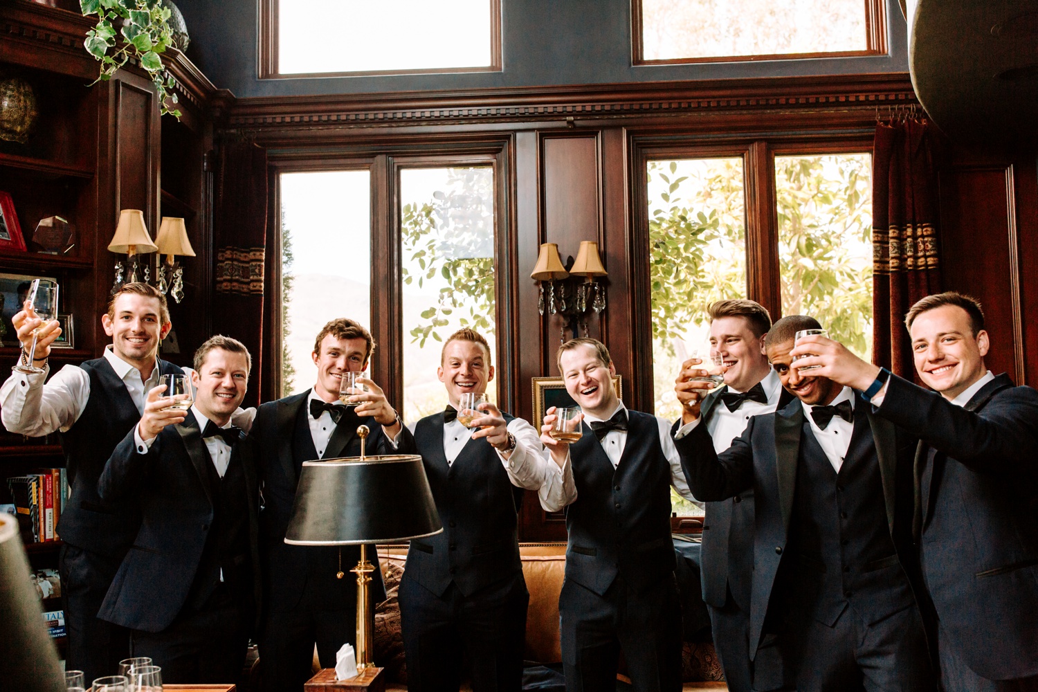 classy groomsmen drinking whiskey